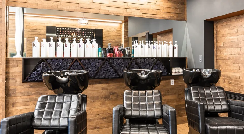 Leather shampoo chairs at the wash bar
